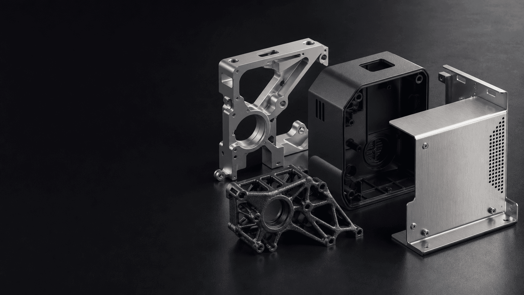Conceptual CGI arrangement of machined, molded, additive, and sheet-metal engineering components