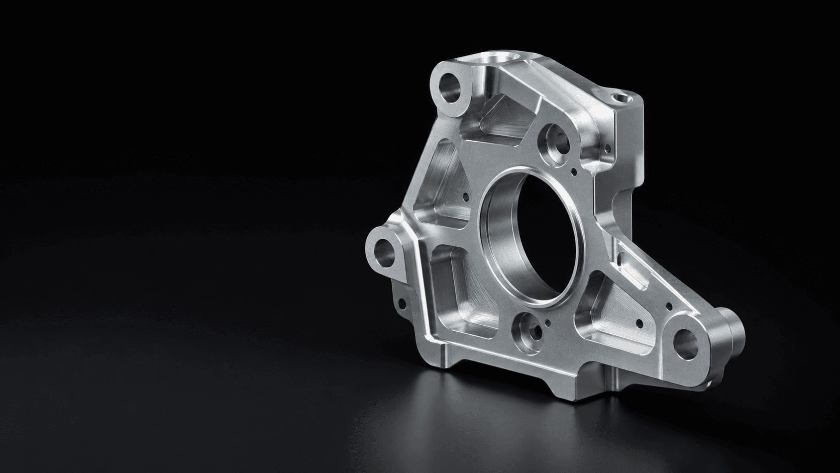 Conceptual CGI render of a precision-machined metal component on a dark studio background